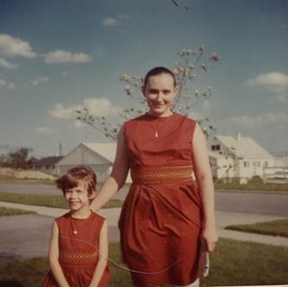 Mom and me in matching mother/daughter dresses, some time in the 1960s